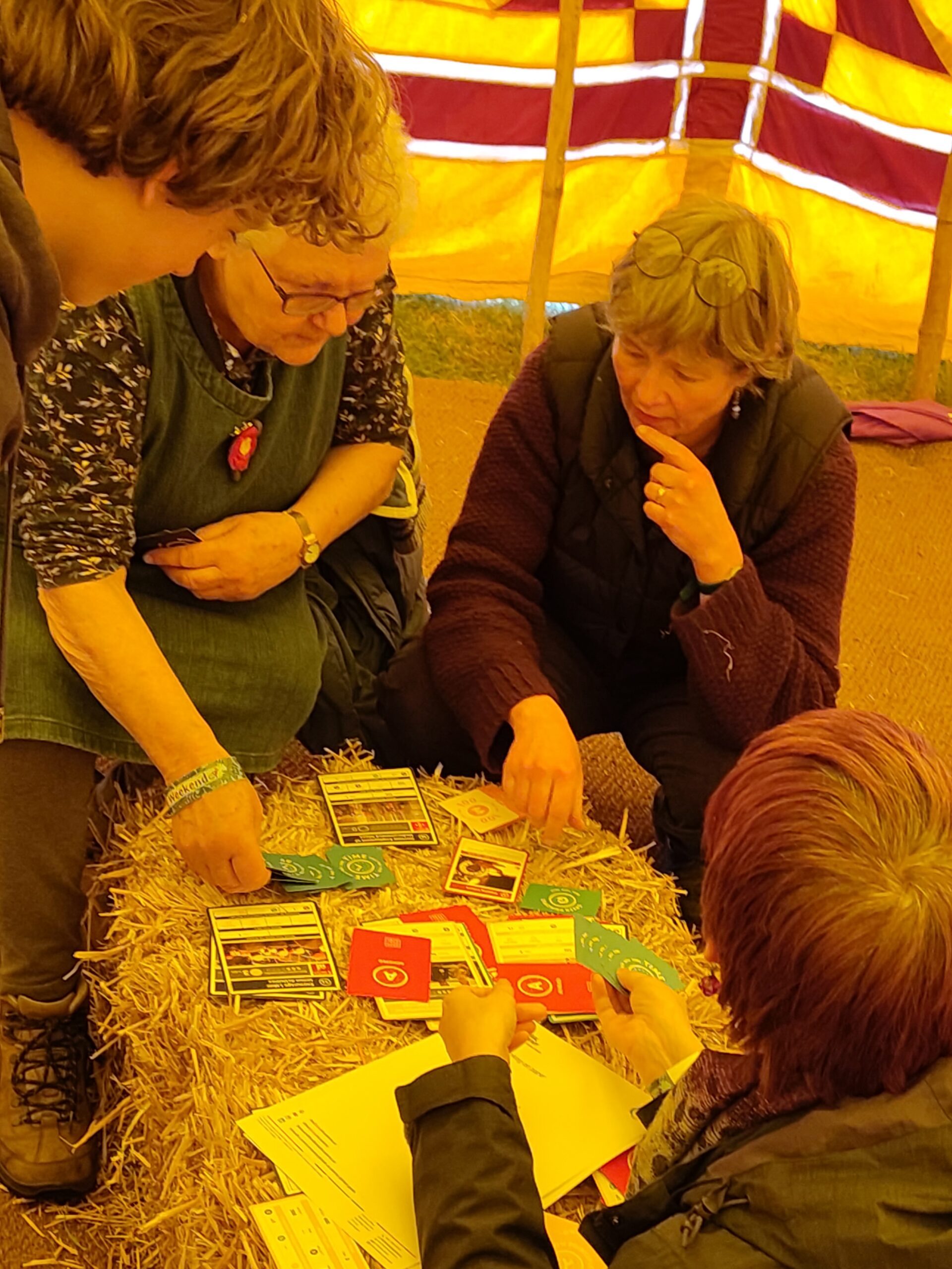 Wood Festival 2026: People playing a game in a yellow tent
